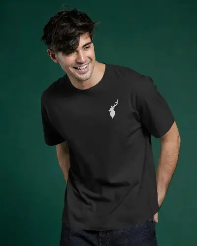 studio-lighting-t-shirt-mockup-smiling-man-wearing-white-tee-on-dark-green-backdrop-modern-fit-style-with-relaxed-pose-casual-fashion-vibe-01553.webp